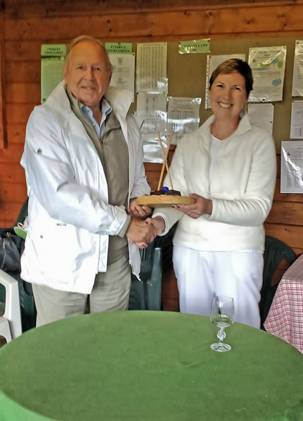 Howard Rosevear (Club President) presents the Golf Croquet Handicap Singles Trophy to Kathryn Smith (winner)